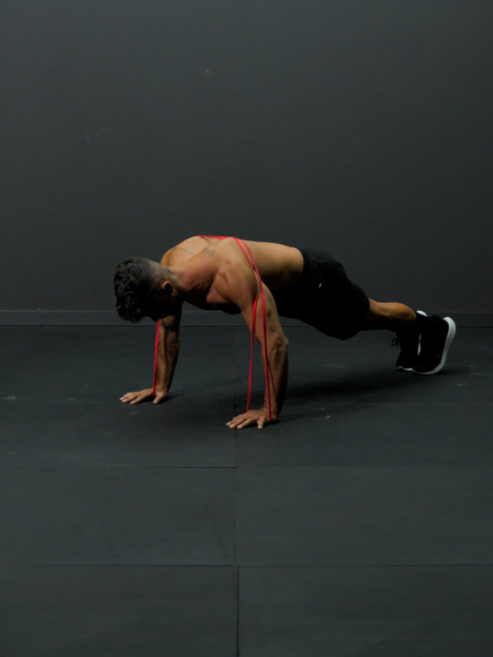 Advanced push-ups with elastic band