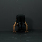Negative wall assisted handstand to tucked planche
