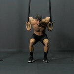 Assisted rings muscle up transition