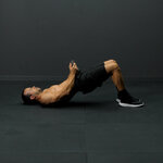 Puente femoral con kettlebell